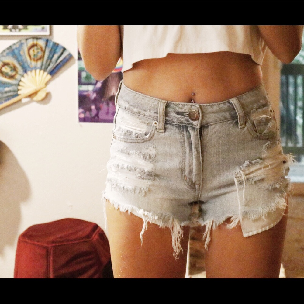 Distressed denim shorts